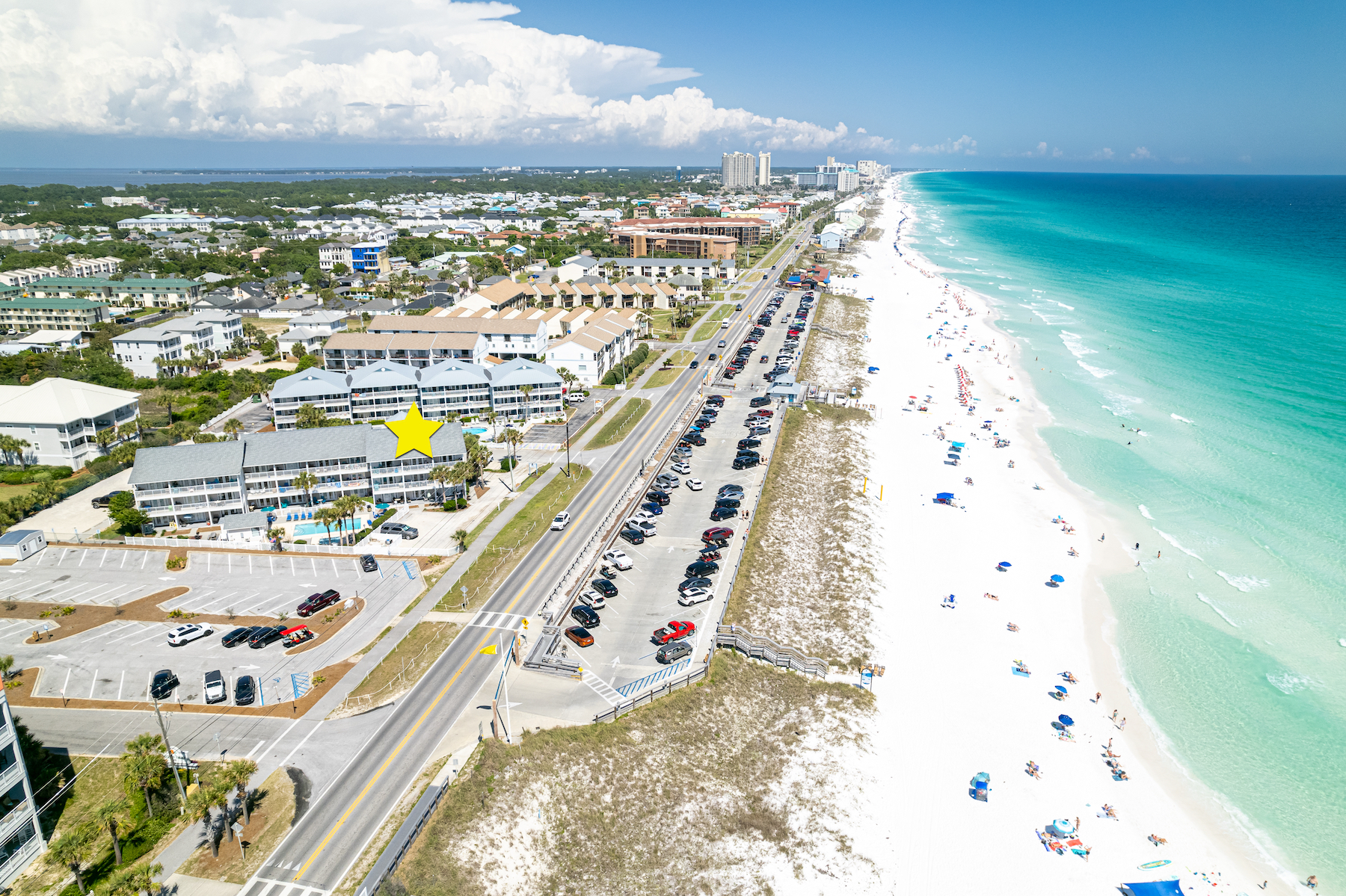 Summer Spell 203 marked by a yellow star beside Miramar Beach and the beach-access crosswalk